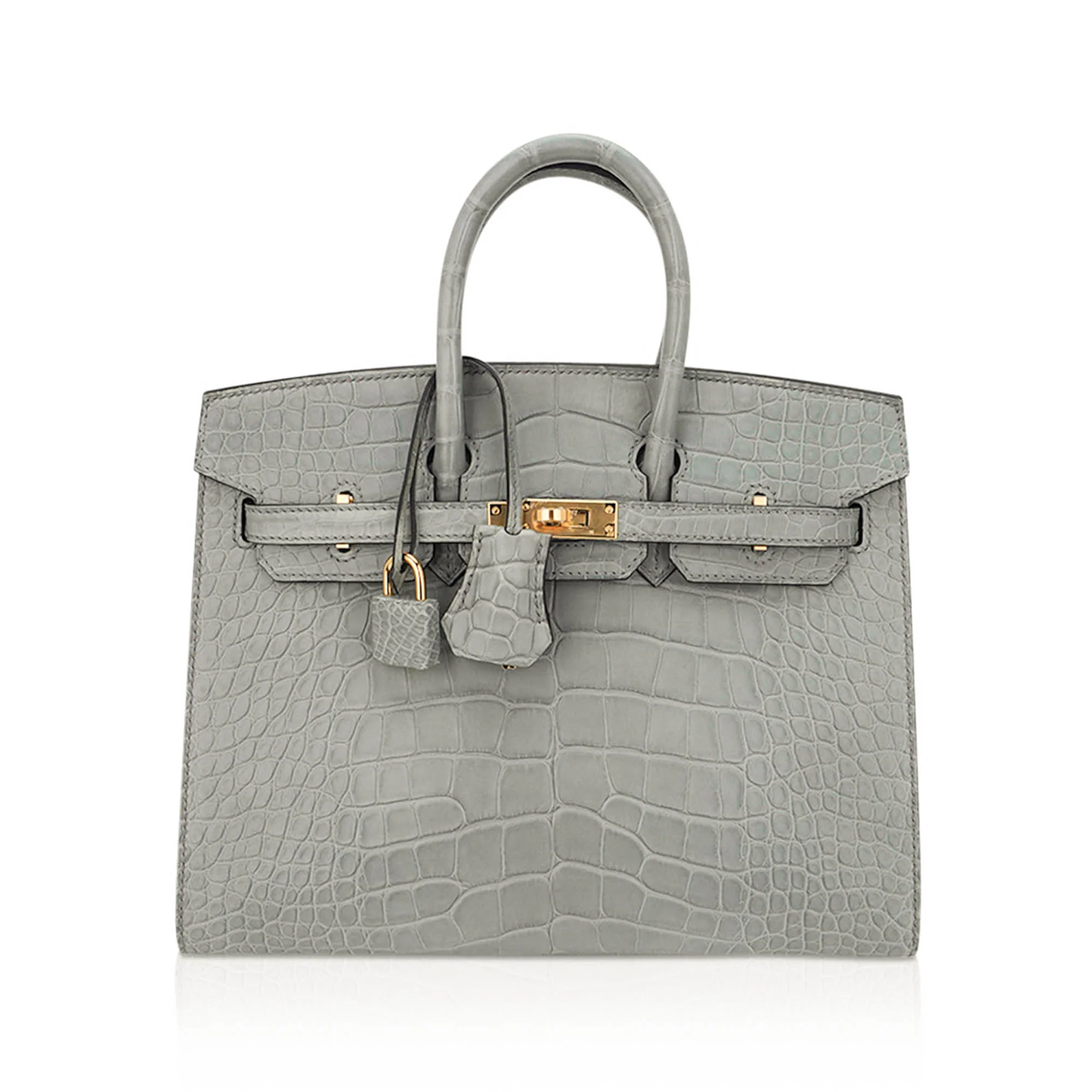 Muted Concrete Grey Large Scale Embossed Compact Sellier Hand Tote With Sharp Tailored Seams, Polished Golden Twist Lock Hardware And Matching Suspended Lock Charm