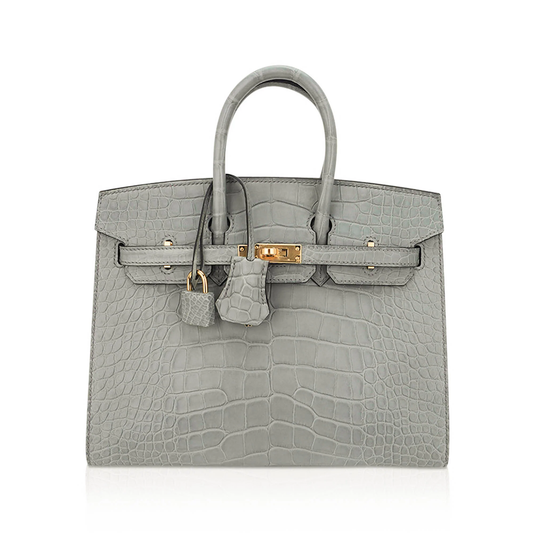 Muted Concrete Grey Large Scale Embossed Compact Sellier Hand Tote With Sharp Tailored Seams, Polished Golden Twist Lock Hardware And Matching Suspended Lock Charm