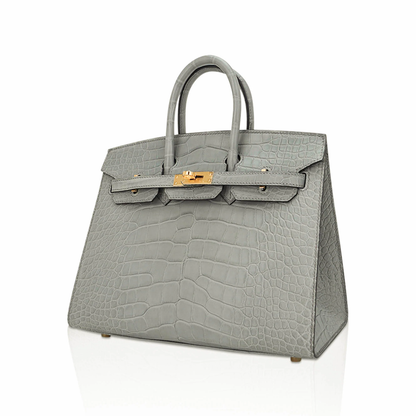Muted Concrete Grey Large Scale Embossed Compact Sellier Hand Tote With Sharp Tailored Seams, Polished Golden Twist Lock Hardware And Matching Suspended Lock Charm